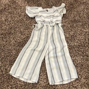 This is a jumper that has thick and thin stripes.